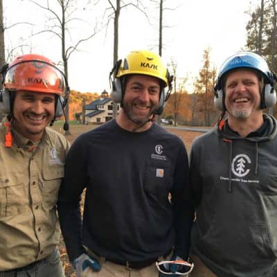 Owners of Charlottesville Tree Service standing side-by-side